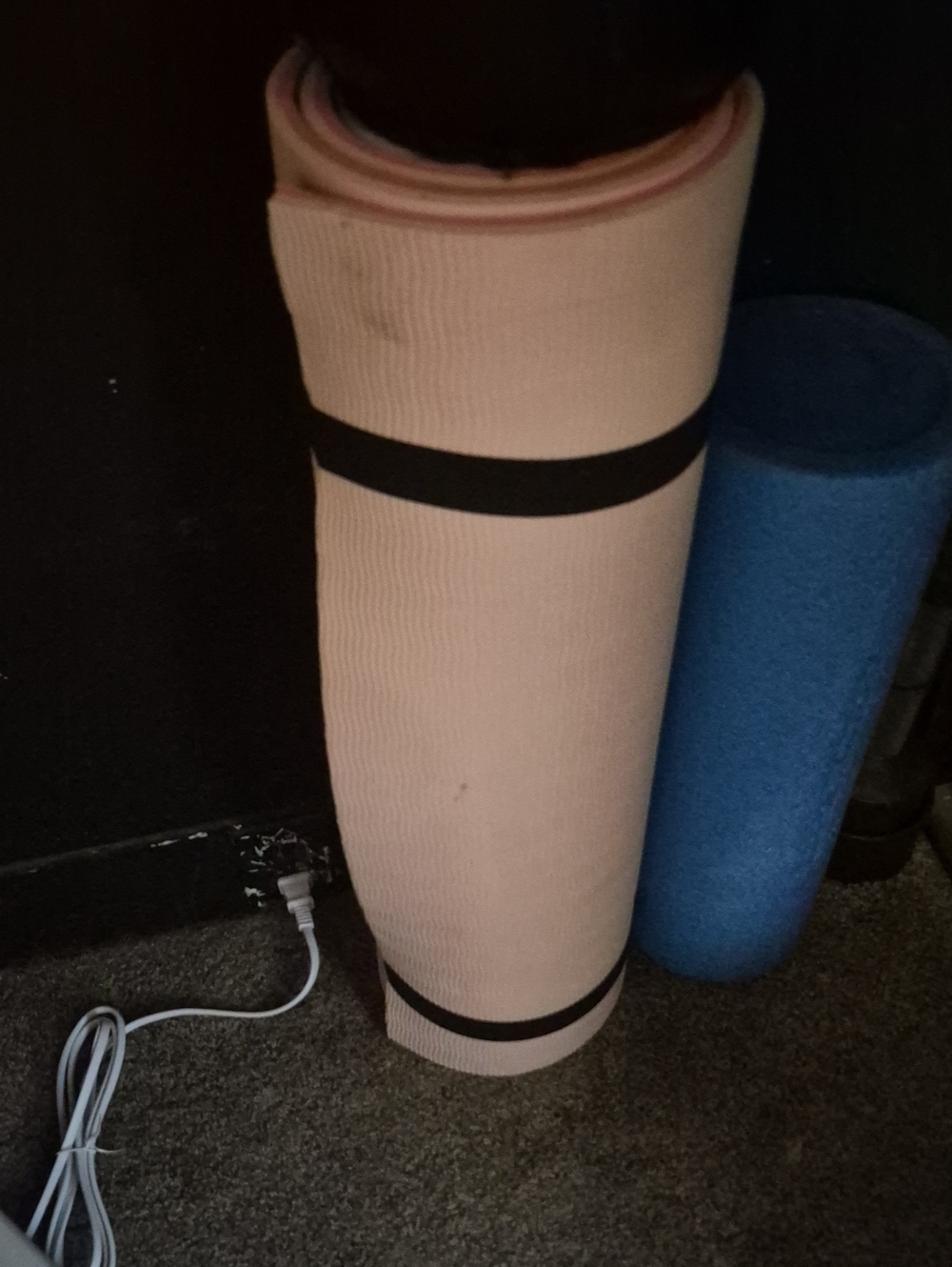 Rolled Pink Yoga Mat